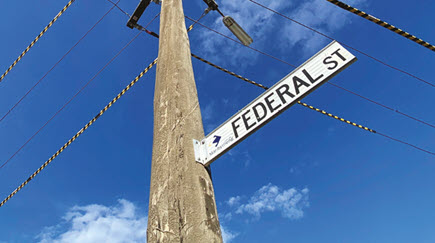 Power pole with sign saying 'Federal Street'