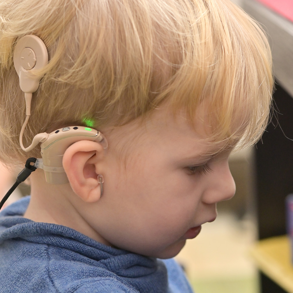 A young boy with a cochlear implant