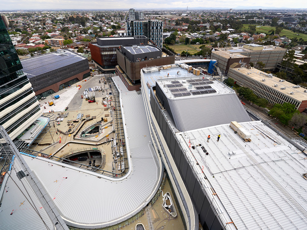 Aerial view of vast light grey roofing