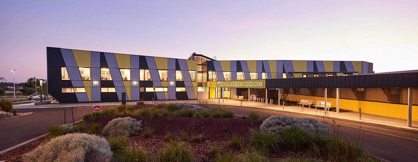 External view of the Melton Health and Community Services health hub at dusk