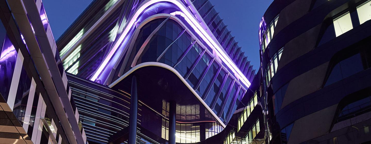 The Victorian Comprehensive Cancer Centre facade at night