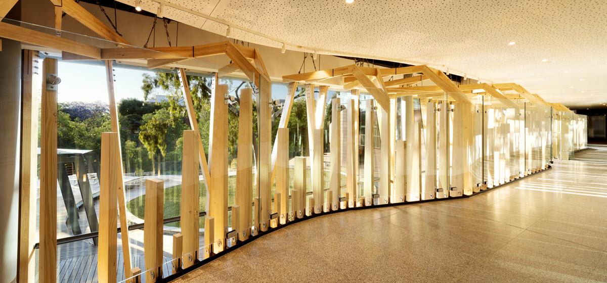 A curved walkway inside the Orygen and OYH Poplar Road precinct redevelopment 