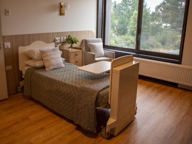 Bedroom of Creswick Nursing Home Dementia Friendly Unit showing bed in front of large window