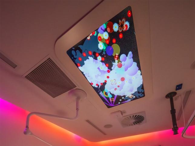 View of Childrens' Emergency Department Cubicle with television screen on ceiling 