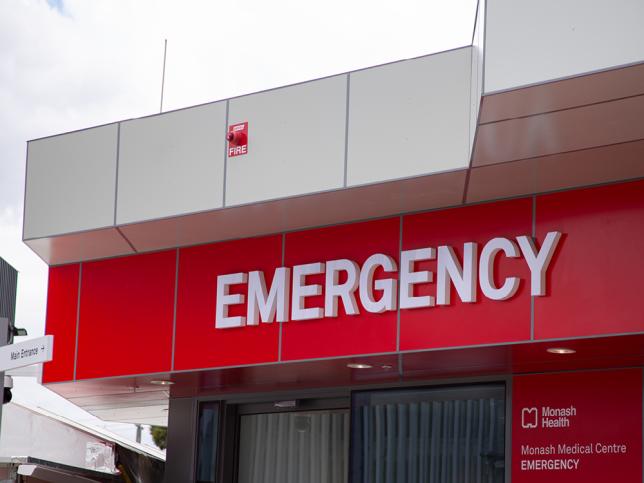 A red sign that says 'EMERGENCY' in white lettering