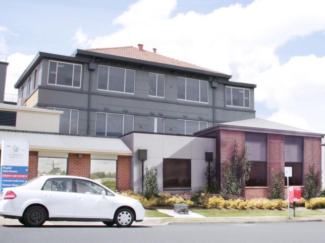 Artist's impression of the Ararat Hopsital redevelopment, showing a grey and brick hospital building