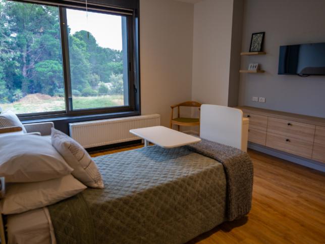 Private bedroom with a large window in the Creswick Nursing Home