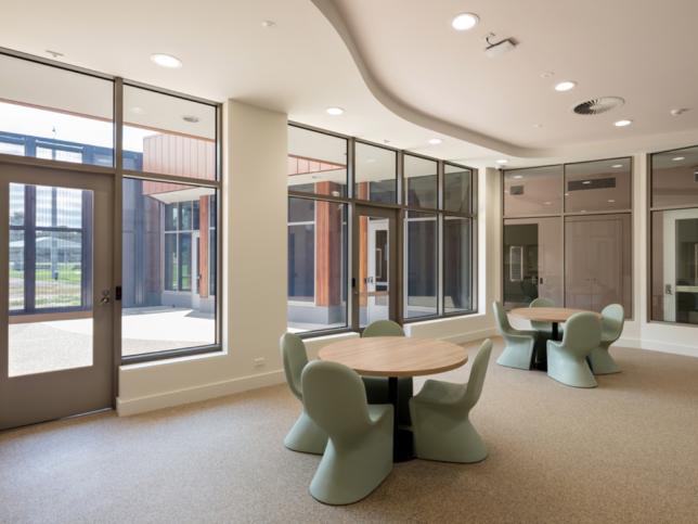 Communal chairs and tables in the dining area at the Thomas Embling Hospital.