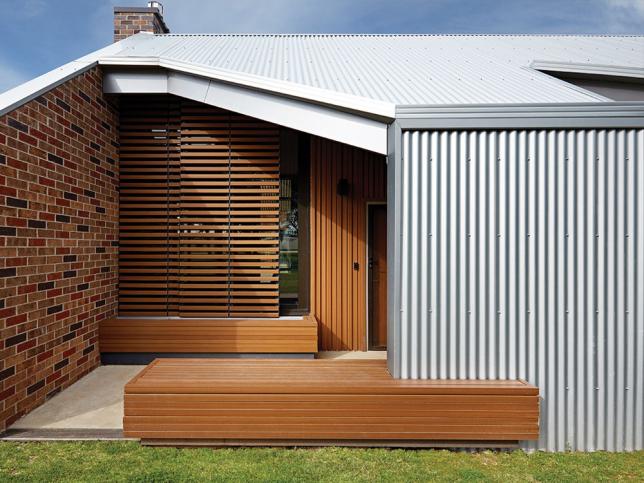 View of the wood and corrugated exterior of the South West Healthcare Prevention and Recovery Care facility