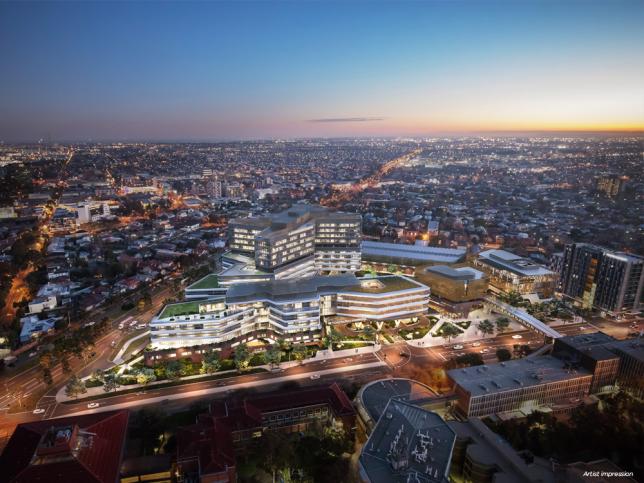 Artist impression of an aerial view of New Footscray Hospital at night, with the horizon seen in the background