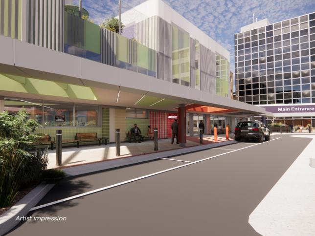 Artist impression of a street view perspective looking at the hospital drop off area, with a green and white facade. There are drop off parking spots on the street in front of the entrance