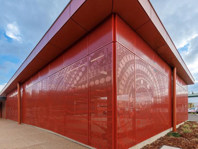 Red perforated metal exterior of new Albury Wodonga Short Stay Unit emergency department