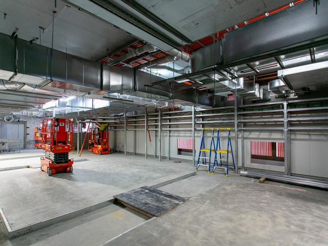 An industrial view of an interior with lots of scaffolding