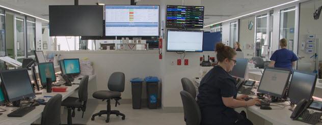 A woman sitting at a computer inside the Northern Hospital's new ICU