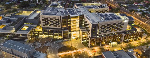 Aerial image of Bendigo Hospital at dusk during stage one construction