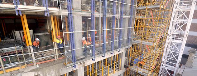 The Eye and Ear Hospital building site with scaffolding and workmen