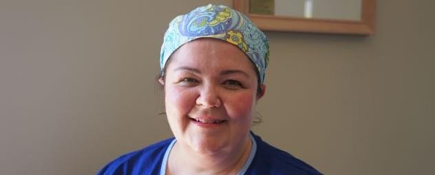 Image of Doctor Helen Roberts wearing medical hair cap