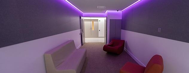 A purple and white mental health bedroom at hte Royal Melbourne Hospital