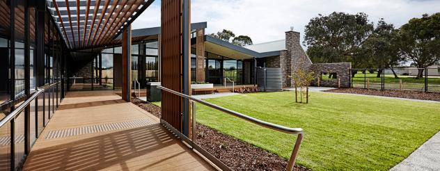 A deck area and courtyard space