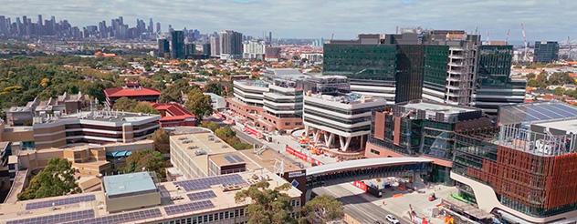 Aerial view of footbridge connecting health and education